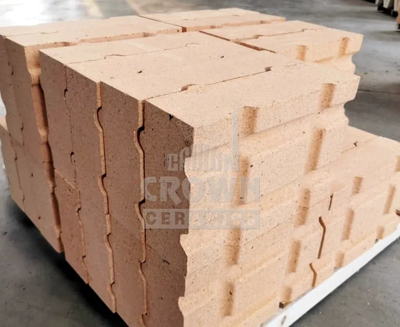 Tongue-and-groove fireclay blocks stacked on a pallet